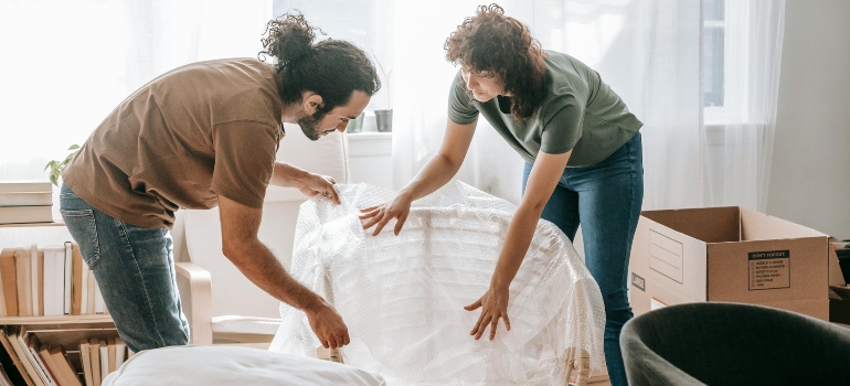 Couple downsizing belongings before moving to Virginia to save on cost of living