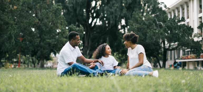 Happy family relaxing in their new Bedford VA home after a successful move.