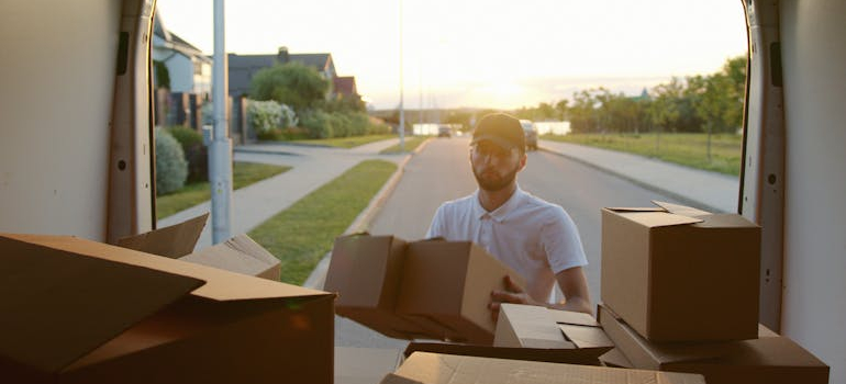 a mover loading a box