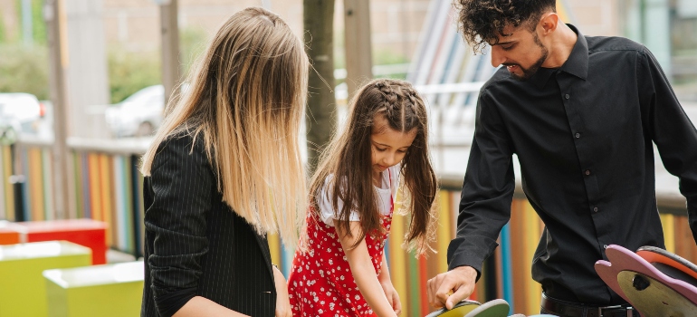 The family spending time together at the playground.